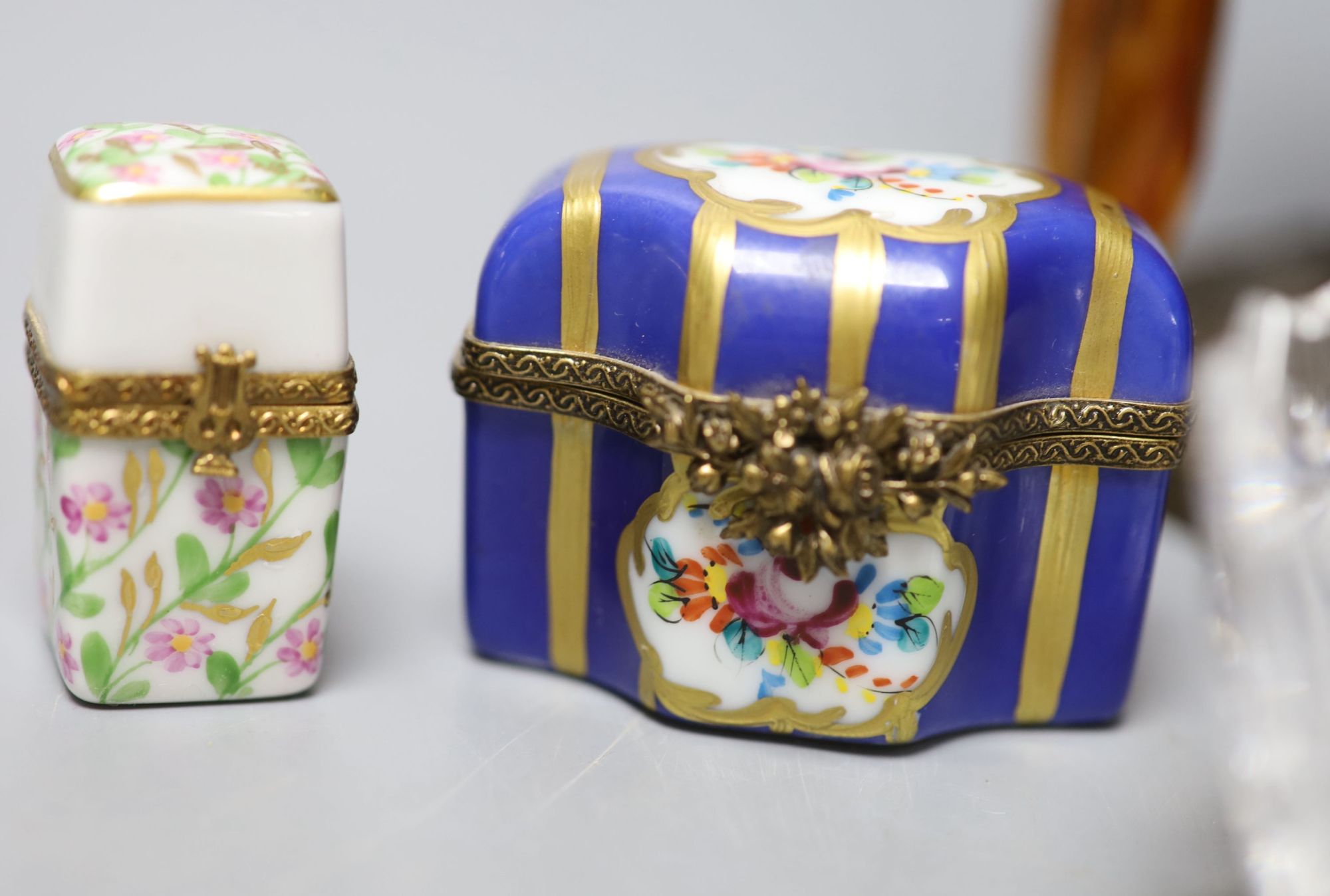 A group of mixed collectables to include a pair of 19th century table lustres, two porcelain scent bottle boxes, a paperweight and glas